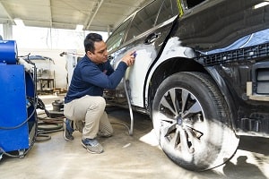 Automotive Collision Repair work being done by a technician at Bavarian Body Works
